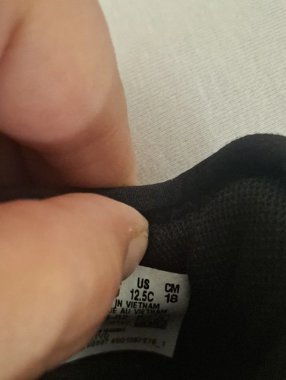 Puma Kids Black Sneakers with Red Logos